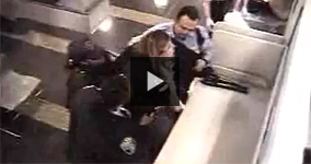 Police Beating Up a Woman at The Airport