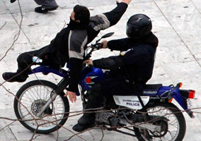 Police Ran Over a Protester With a Bike