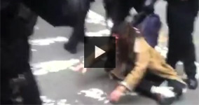 NYPD Cop Manhandles a Girl Protester During Arrest